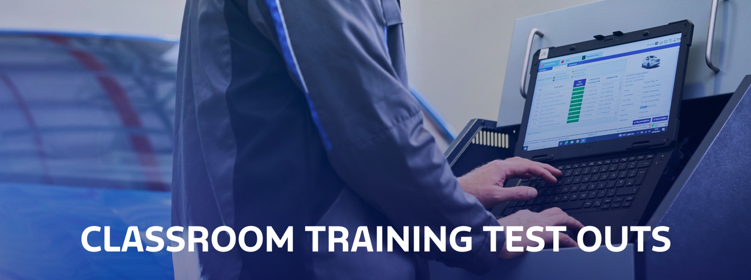 Classroom training test outs Banner. graphic. mechanic working with a laptop.